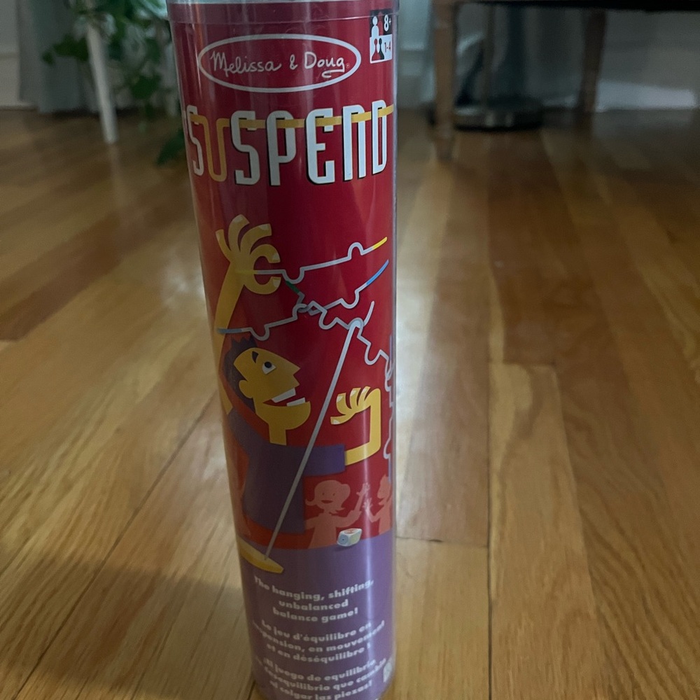 New unopened Melissa & Doug Suspend Game - Vibrant Red sealed packaging